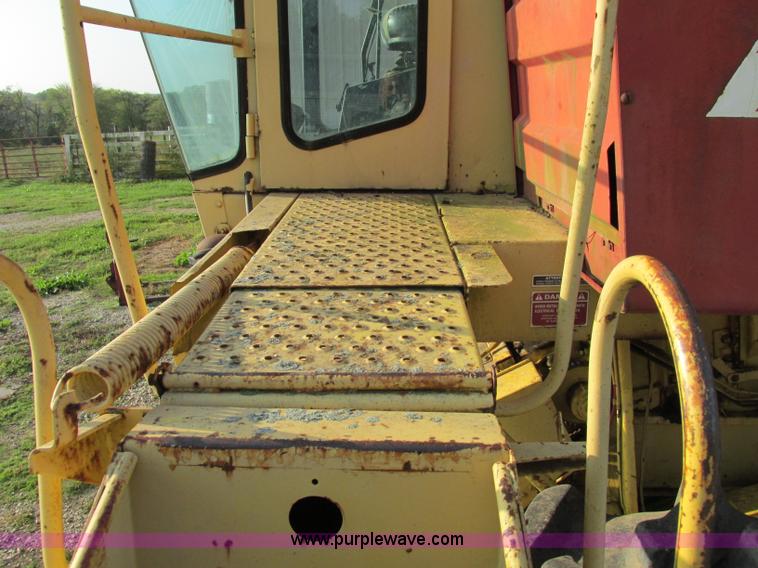 image for item F5297 1981 New Holland TR85 RWA combine with header