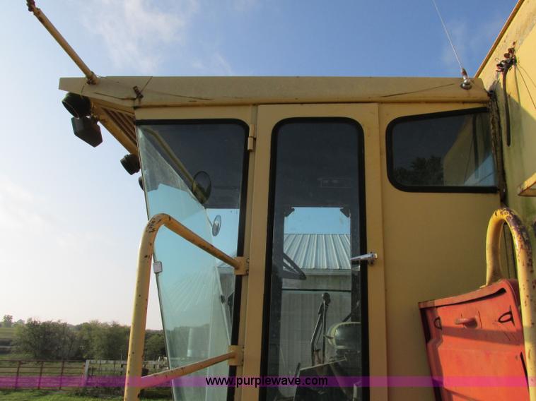 image for item F5297 1981 New Holland TR85 RWA combine with header