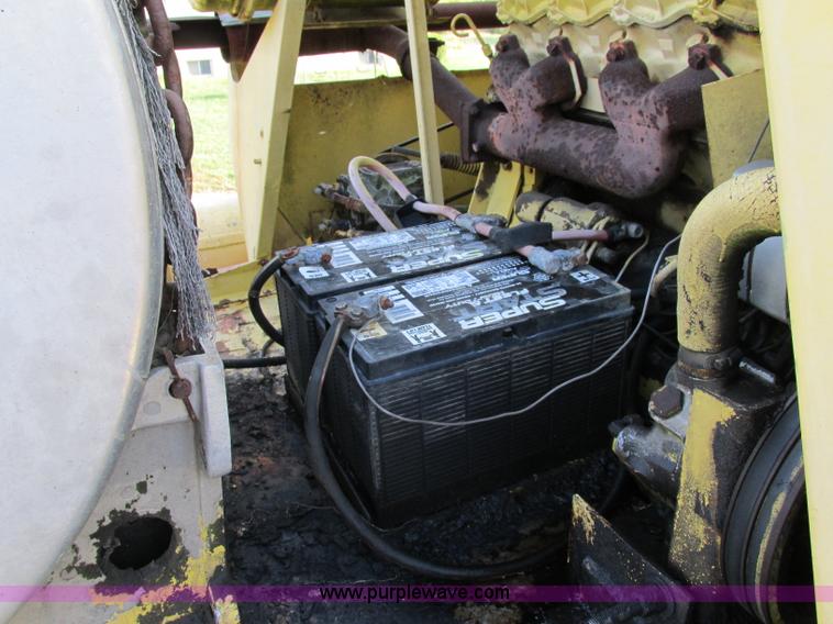 image for item F5297 1981 New Holland TR85 RWA combine with header