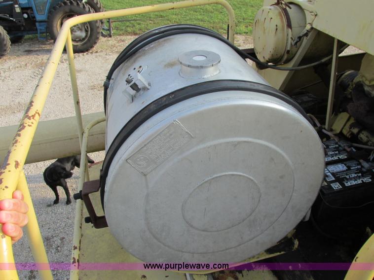 image for item F5297 1981 New Holland TR85 RWA combine with header