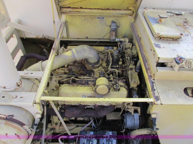 image for item F5297 1981 New Holland TR85 RWA combine with header