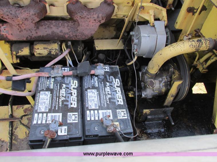 image for item F5297 1981 New Holland TR85 RWA combine with header