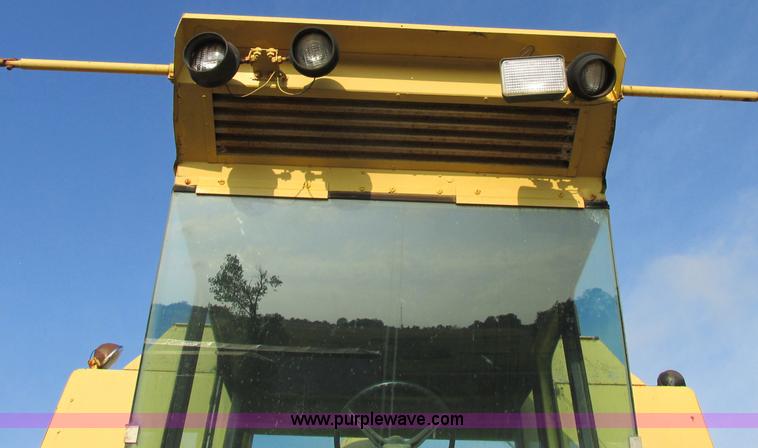 image for item F5297 1981 New Holland TR85 RWA combine with header