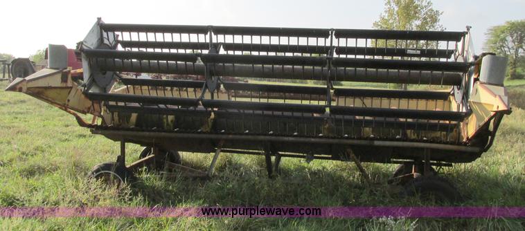 image for item F5297 1981 New Holland TR85 RWA combine with header