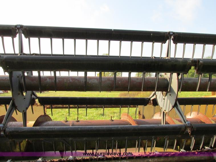 image for item F5297 1981 New Holland TR85 RWA combine with header