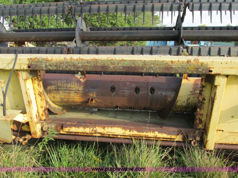 image for item F5297 1981 New Holland TR85 RWA combine with header