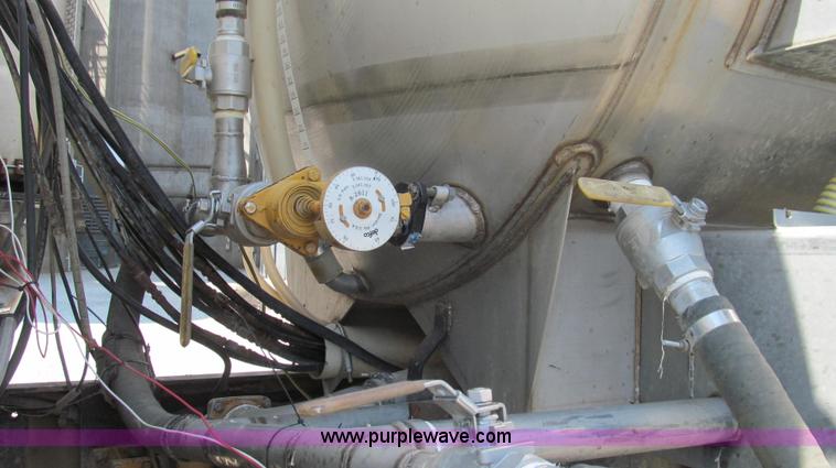 image for item G2103 1999 Sterling L8513 pre/post liquid fertilizer applicator sprayer