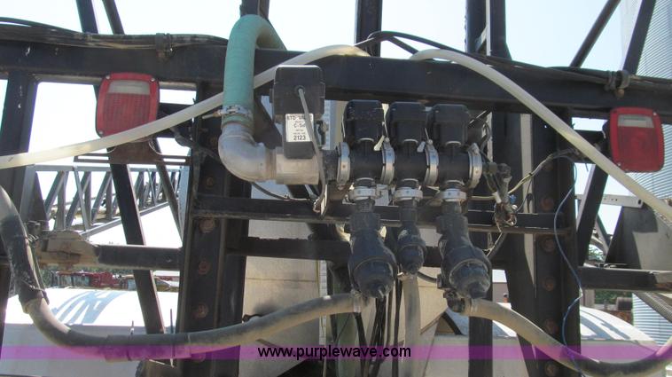 image for item G2103 1999 Sterling L8513 pre/post liquid fertilizer applicator sprayer