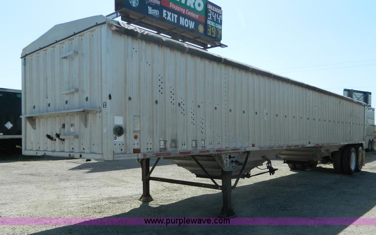 image for item G7996 1980 Wilson AGH-600 double hopper aluminum grain trailer