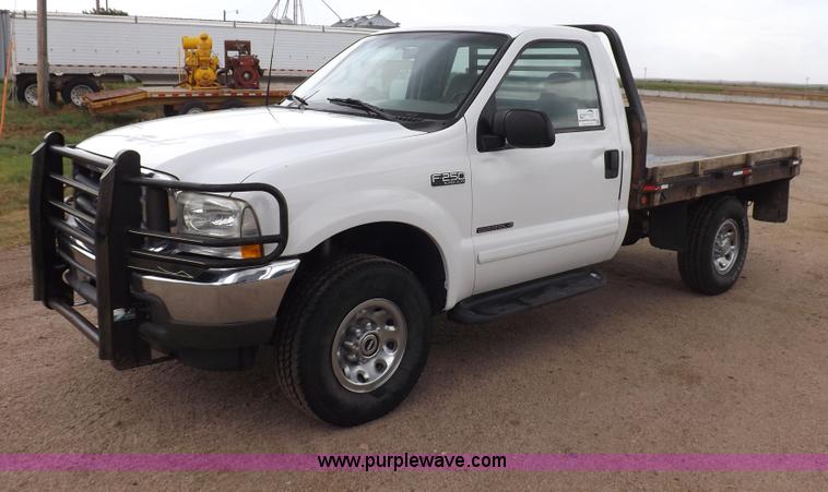 image for item I7552 2002 Ford F250 Super Duty flatbed truck