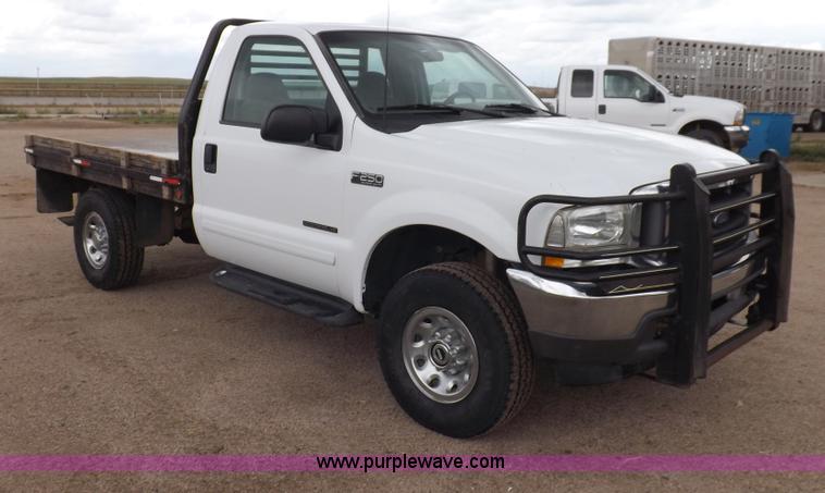 image for item I7552 2002 Ford F250 Super Duty flatbed truck