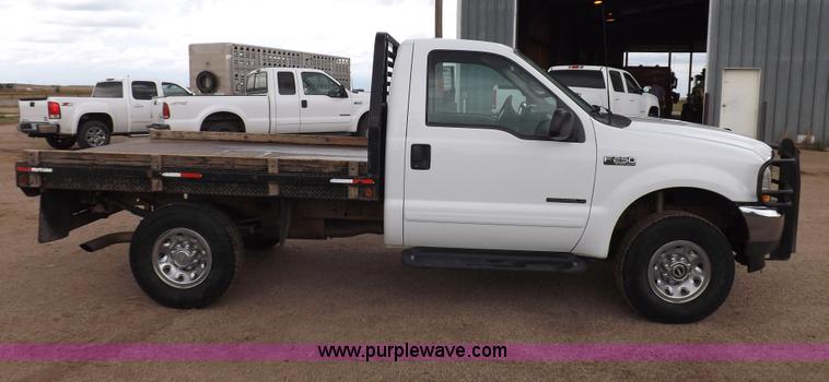 image for item I7552 2002 Ford F250 Super Duty flatbed truck
