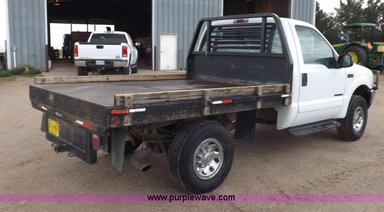 image for item I7552 2002 Ford F250 Super Duty flatbed truck