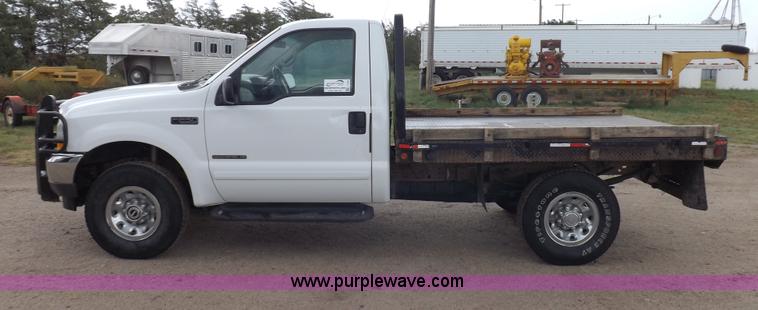 image for item I7552 2002 Ford F250 Super Duty flatbed truck