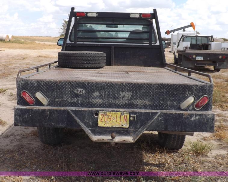 image for item I7583 2005 Ford F350  XL Super Duty flatbed truck