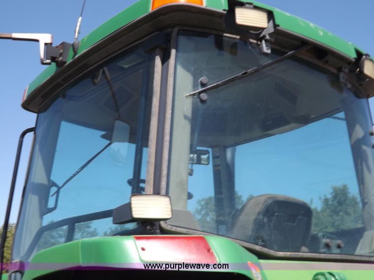 image for item I7587 1996 John Deere 8400 MFWD tractor