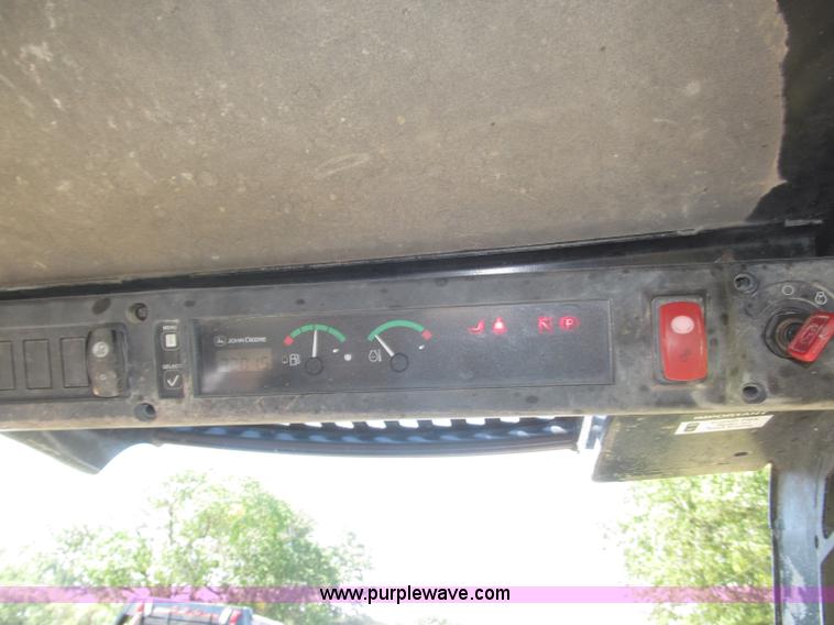 image for item F7134 John Deere 325 skid steer