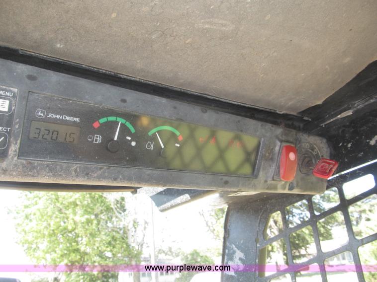 image for item F7134 John Deere 325 skid steer