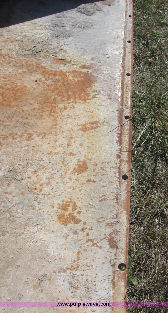 image for item F7134 John Deere 325 skid steer