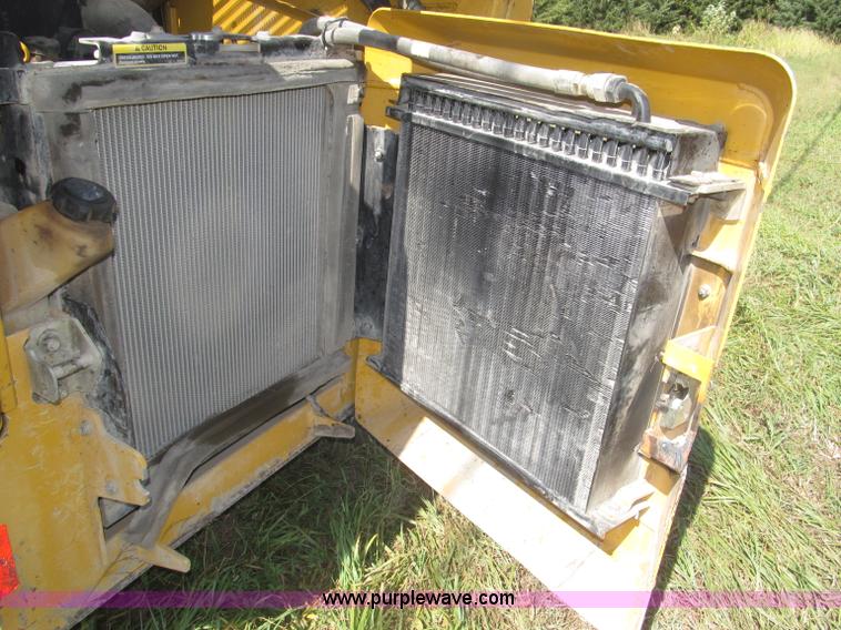 image for item F7134 John Deere 325 skid steer