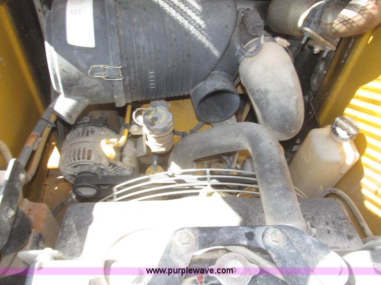 image for item F7134 John Deere 325 skid steer