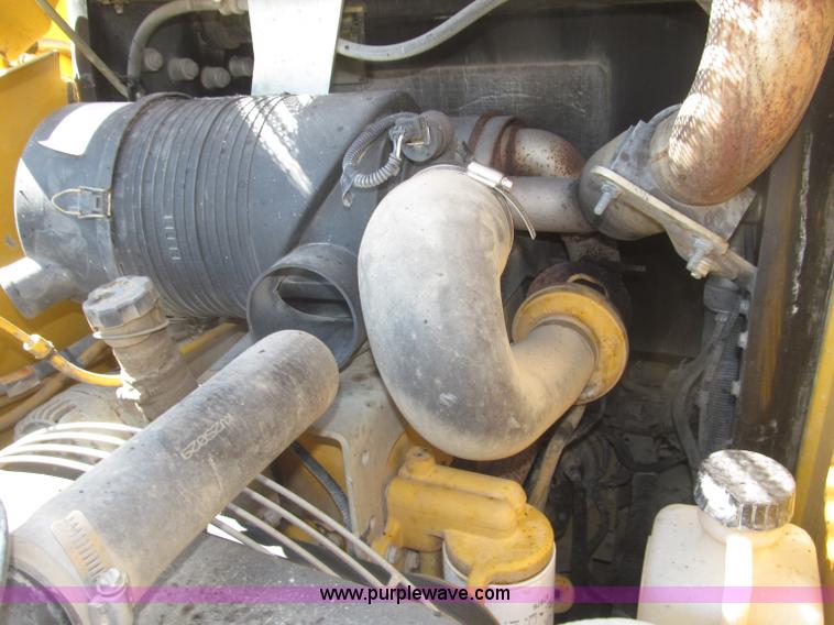 image for item F7134 John Deere 325 skid steer