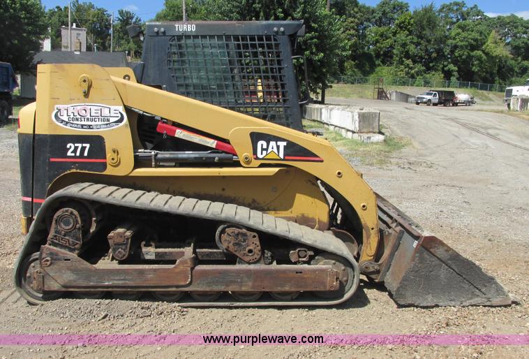 image for item E7355 Caterpillar 277 track skid steer