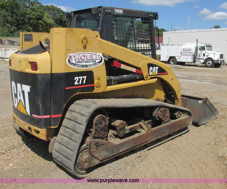 image for item E7355 Caterpillar 277 track skid steer