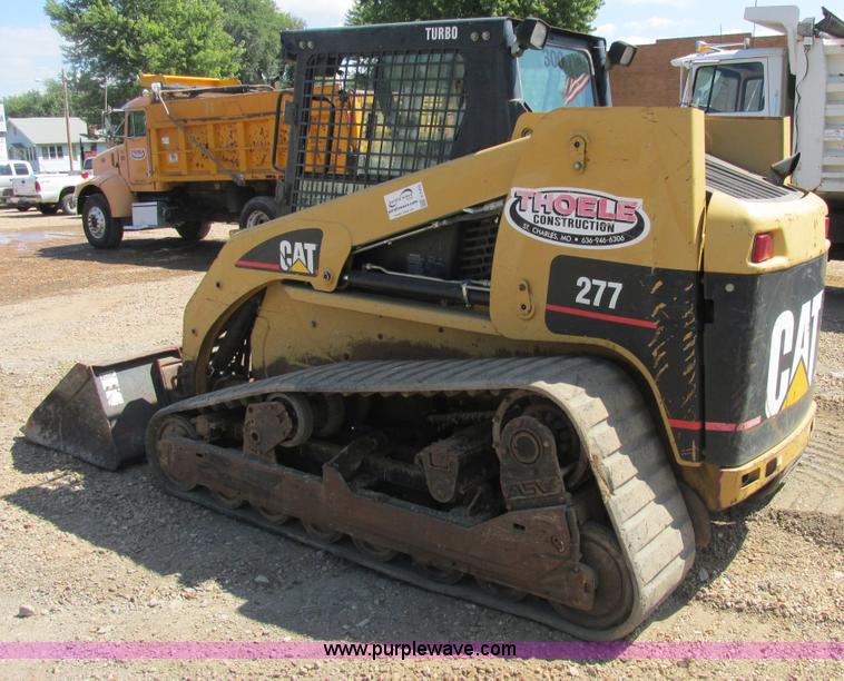 image for item E7355 Caterpillar 277 track skid steer