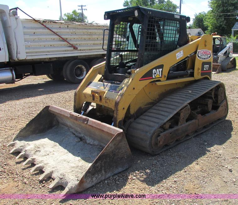 image for item E7355 Caterpillar 277 track skid steer