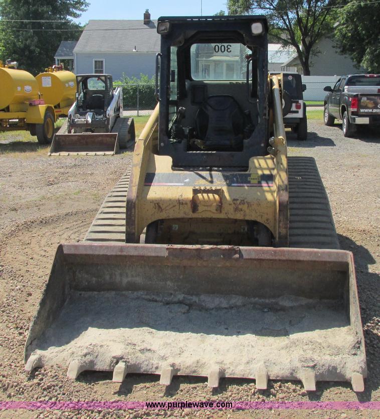 image for item E7355 Caterpillar 277 track skid steer