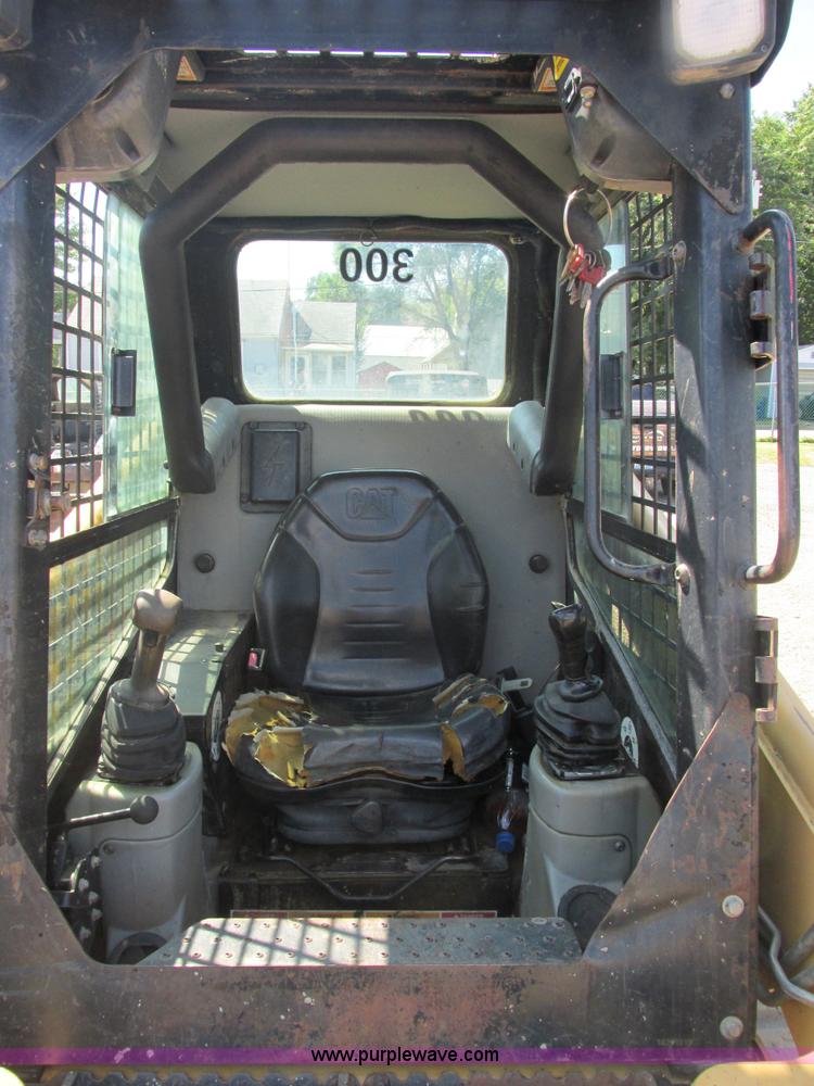 image for item E7355 Caterpillar 277 track skid steer