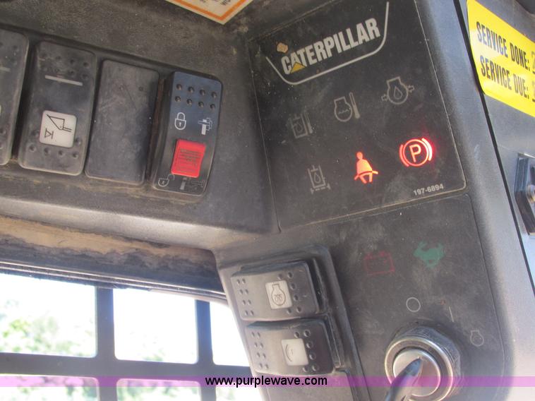 image for item E7355 Caterpillar 277 track skid steer