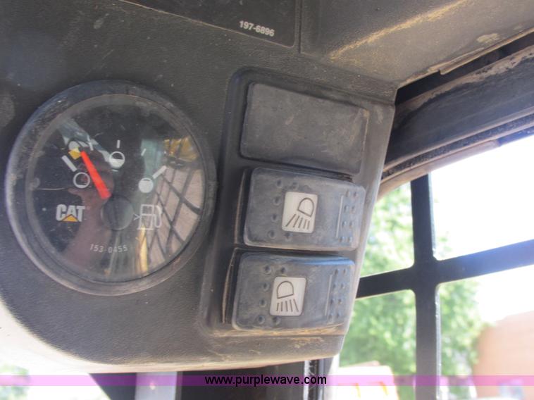 image for item E7355 Caterpillar 277 track skid steer