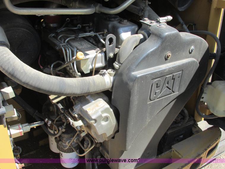 image for item E7355 Caterpillar 277 track skid steer