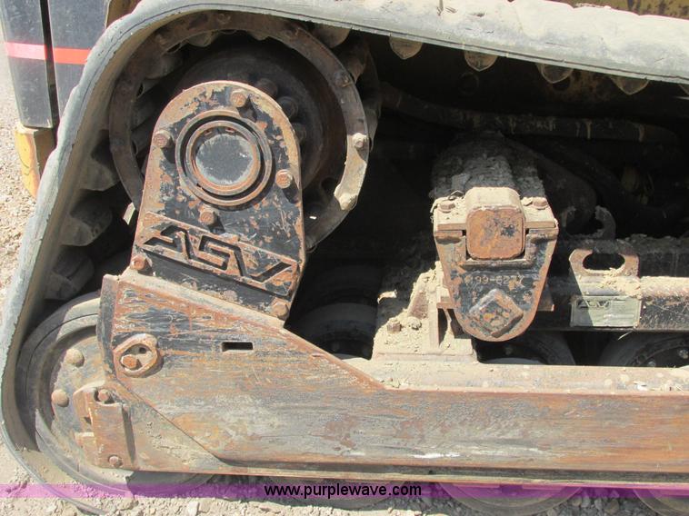 image for item E7355 Caterpillar 277 track skid steer