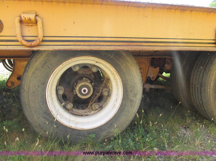 image for item E7358 2000 Trailboss triple axle tag trailer