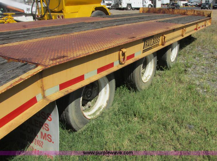 image for item E7358 2000 Trailboss triple axle tag trailer