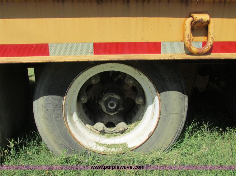 image for item E7358 2000 Trailboss triple axle tag trailer