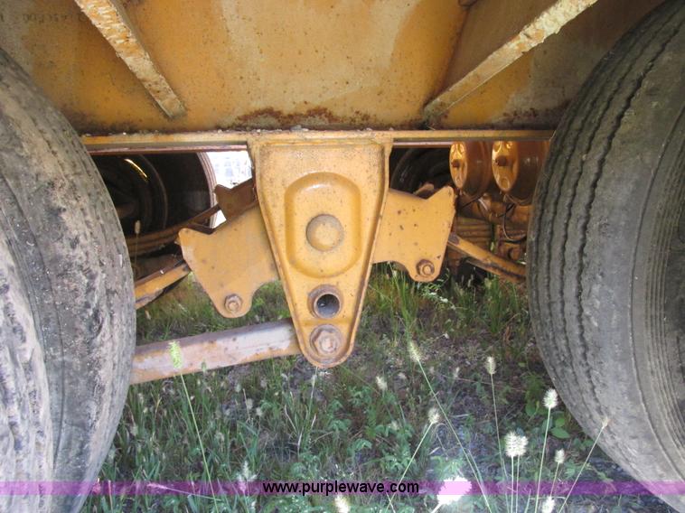 image for item E7358 2000 Trailboss triple axle tag trailer