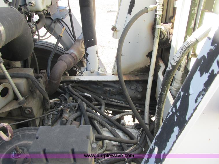 image for item E7359 1996 Ford CF7000 street sweeper