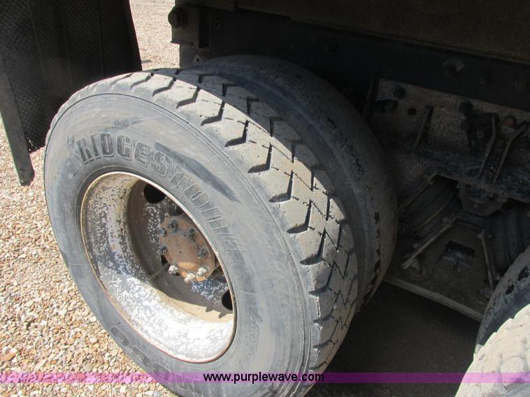 image for item E7360 2002 Peterbilt 330 dump truck