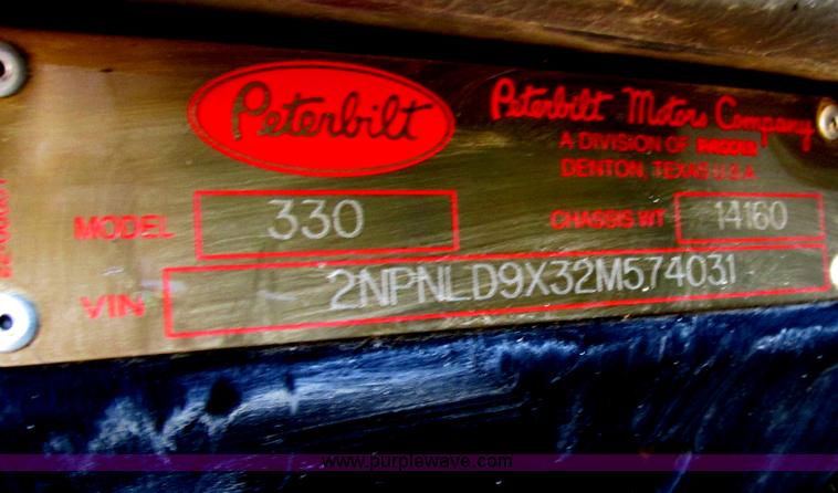 image for item E7360 2002 Peterbilt 330 dump truck