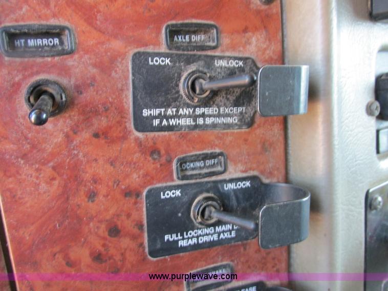 image for item E7360 2002 Peterbilt 330 dump truck