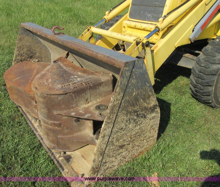 image for item E7365 2001 New Holland LB75 backhoe