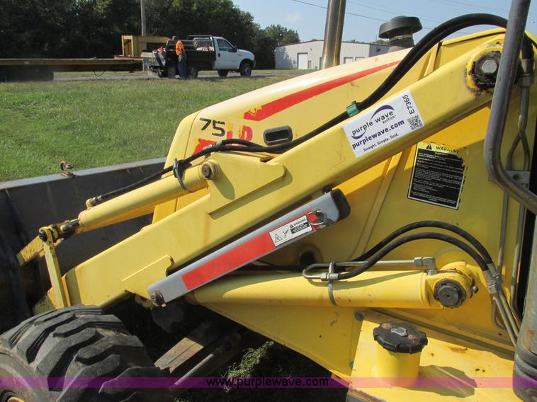 image for item E7365 2001 New Holland LB75 backhoe
