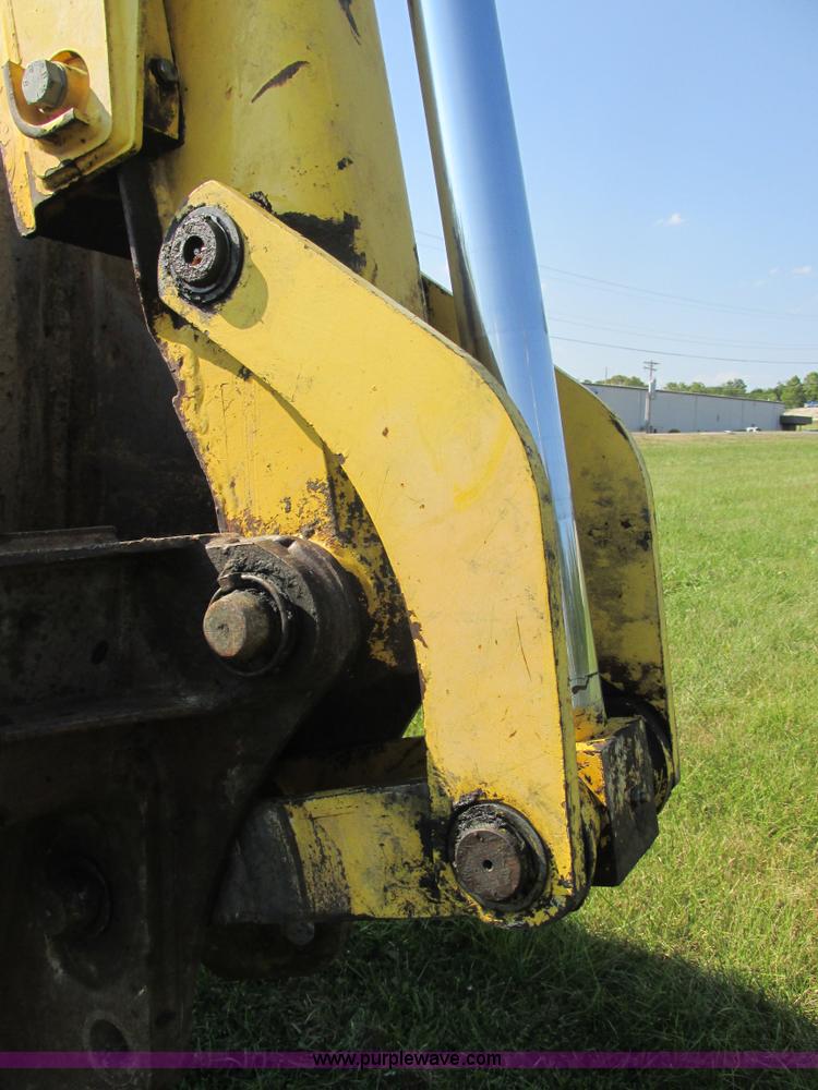 image for item E7365 2001 New Holland LB75 backhoe
