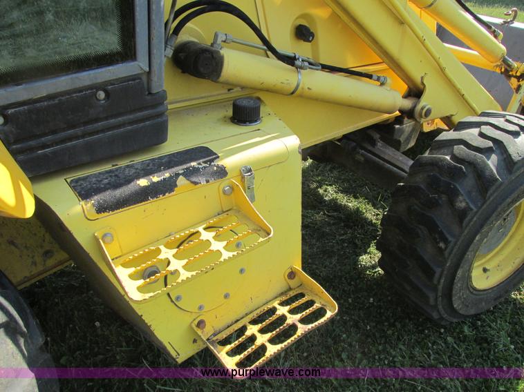 image for item E7365 2001 New Holland LB75 backhoe