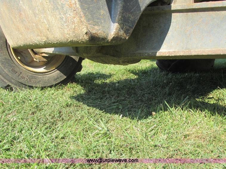 image for item E7365 2001 New Holland LB75 backhoe