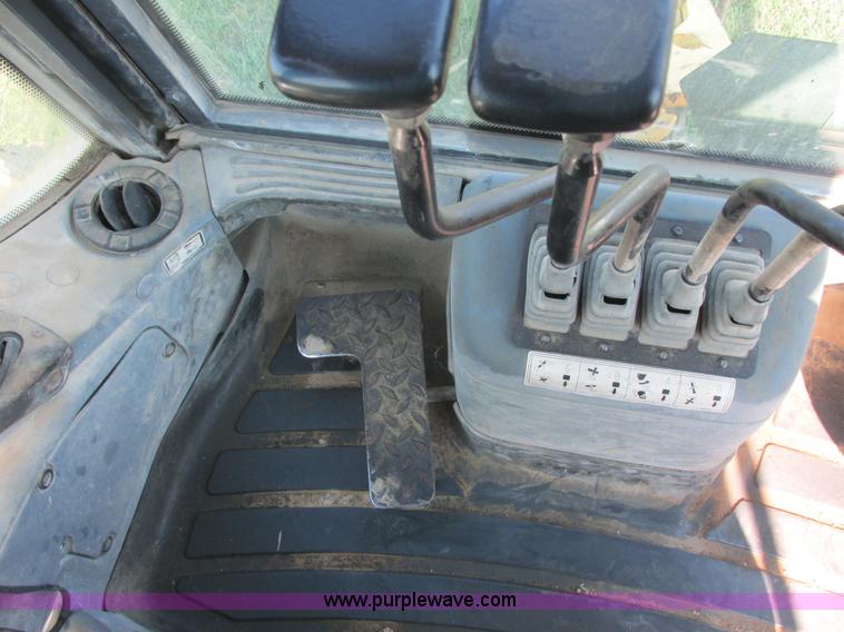 image for item E7365 2001 New Holland LB75 backhoe
